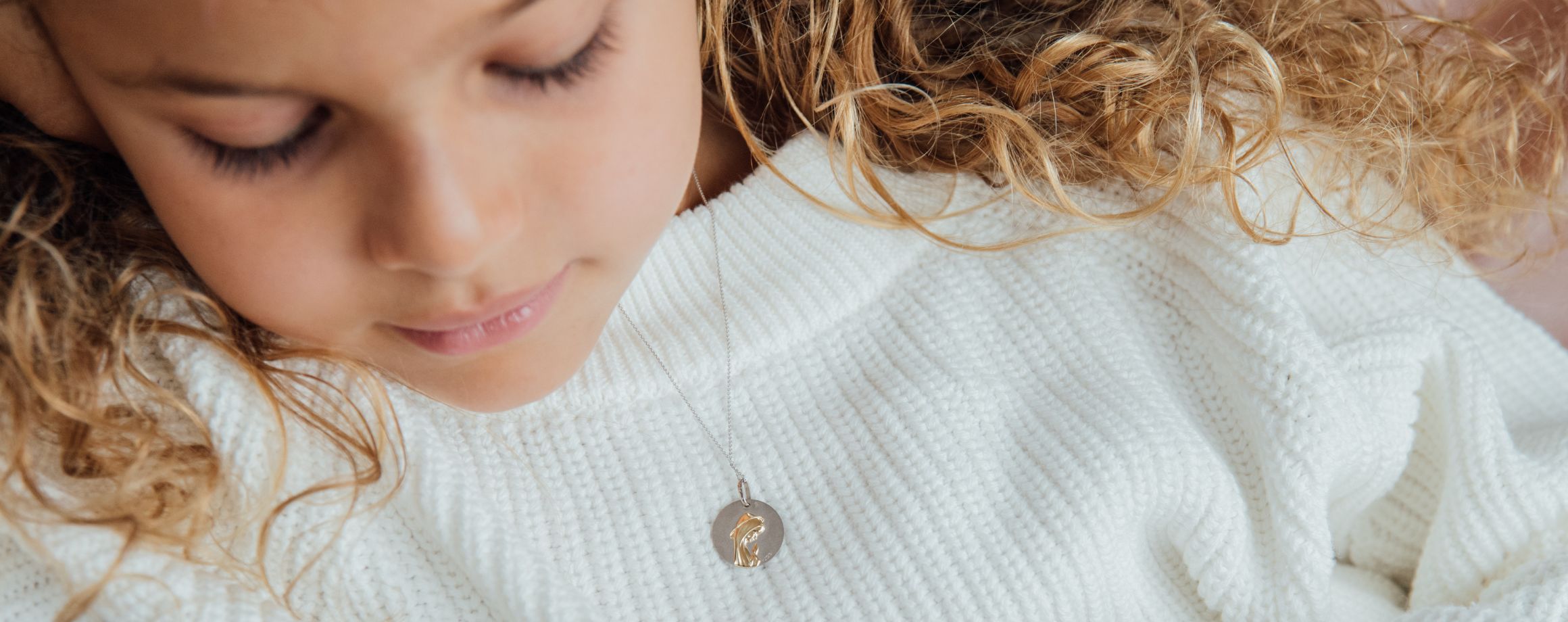 Girls’ christening medallions